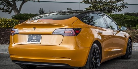 Tesla wrapped in Avery SW900 Gloss Gold Orange Pearlescent vinyl