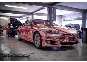 Tesla wrapped in Avery SW Rose Gold Chrome vinyl
