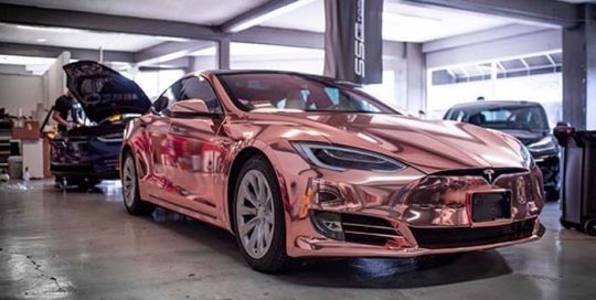 Tesla wrapped in Avery SW Rose Gold Chrome vinyl