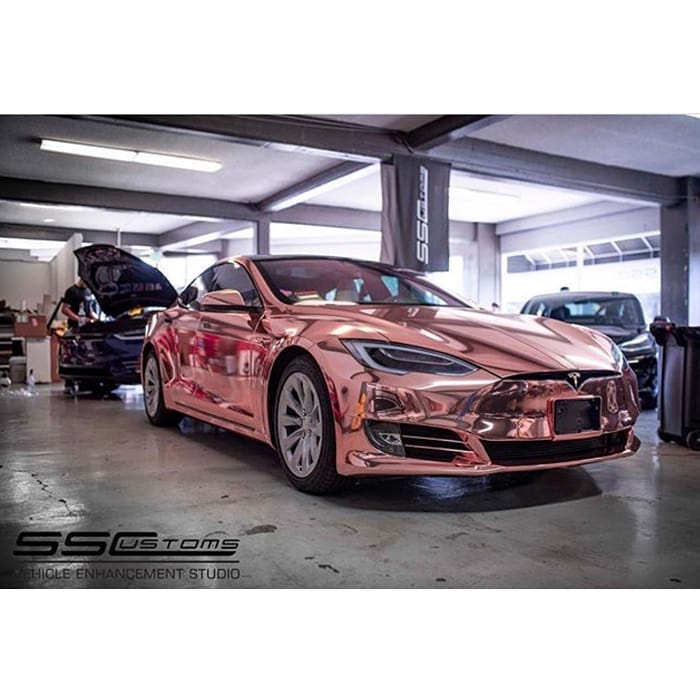 Tesla wrapped in Avery SW Rose Gold Chrome vinyl