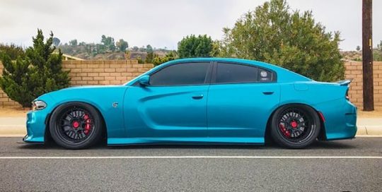 Dodge wrapped in 3M 1080 Gloss Atomic Teal vinyl