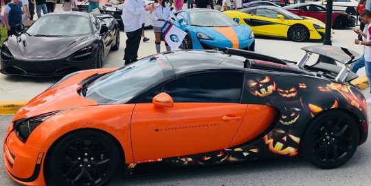Bugatti wrapped in custom printed Avery 1105EZRS vinyl with 1380z Matte overlaminate
