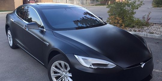 tesla wrapped in 3M 1080 Satin Black vinyl
