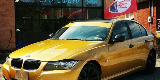 Bmw wrapped in 3M 1080 Gloss Gold Metallic vinyl