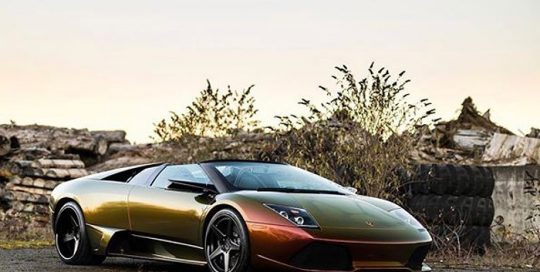 Lamborghini wrapped in Avery ColorFlow Rising Sun Red/Gold shade shifting vinyl