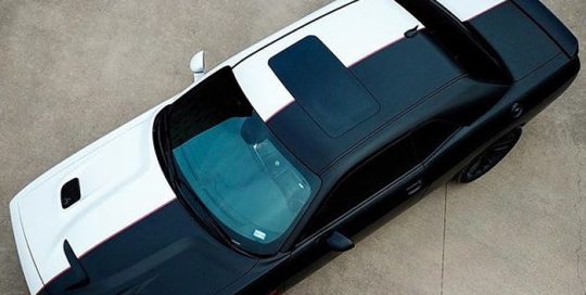 Dodge wrapped in 3M ColorFlip Ghost Pearl White and Avery SW Satin Black vinyls