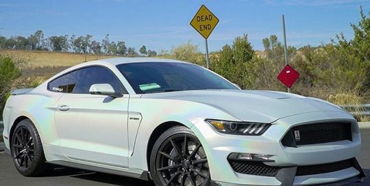 Ford Mustang wrapped in 3M ColorFlip Satin Ghost Pearl shade shifting vinyl