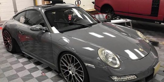 Porsche wrapped in Avery SW Gloss Dark Grey vinyl