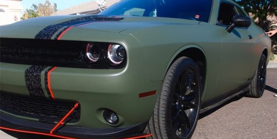 Dodge wrapped in 3M 1080 Matte Military Green and the stripe in 3M 1080 Shadow Black vinyl