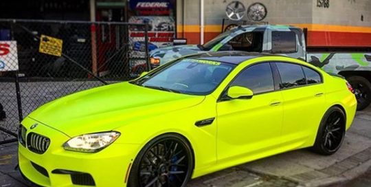 Bmw wrapped in 3M Satin Neon Fluorescent Yellow vinyl