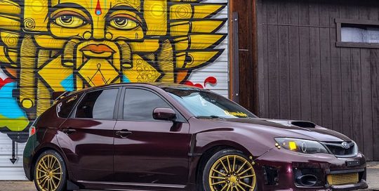 Subaru Wrx wrapped in 3M 1080 Gloss Black Rose vinyl