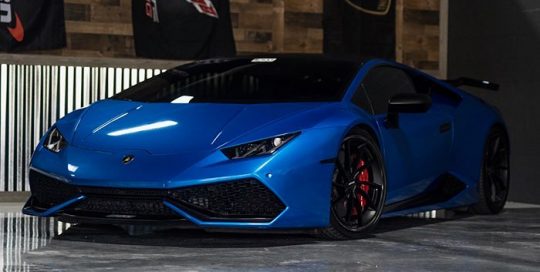 Lamborghini Huracan wrapped in 3M 1080 Gloss Fire Blue vinyl