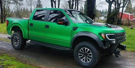 Ford Raptor wrapped in 3M 1080 Satin Sheer Luck Green vinyl