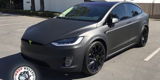 Tesla 3 wrapped in 3M 1080 Matte Deep Black vinyl