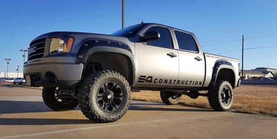 Gmc Sierra wrapped in 3M 1080 Matte Dark Gray and Gloss Black vinyls