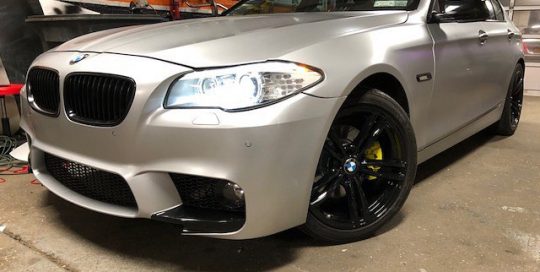 Bmw 5series wrapped in 3M 1080 Satin White Aluminum vinyl