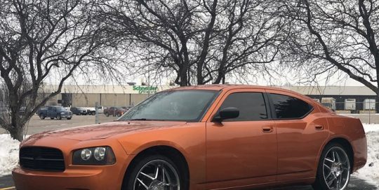 Dodge Charger wrapped in 3M 1080 Gloss Liquid Copper vinyl