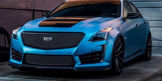 Cadillac Cvs wrapped in 3M 1080 Satin Ocean Shimmer vinyl