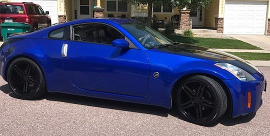 Nissan 350z wrapped in 3M 1080 Gloss Blue Raspberry vinyl