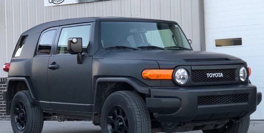 Toyota Fj Cruiser wrapped in 3M 1080 Matte Deep Black vinyl