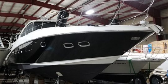 Searay Boat wrapped in 3M 1080 Gloss Black Metallic vinyl