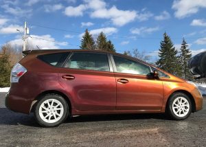 Toyota Prius wrapped in Avery ColorFlow Gloss Rising Sun Red/Gold shade shifting vinyl