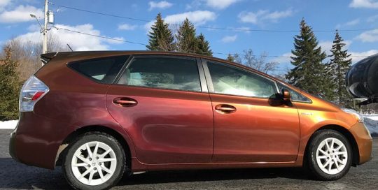 Toyota Prius wrapped in Avery ColorFlow Gloss Rising Sun Red/Gold shade shifting vinyl