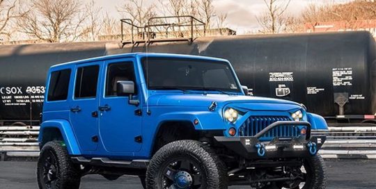 Jeep Wrangler wrapped in 3M 1080 Matte Blue Metallic vinyl