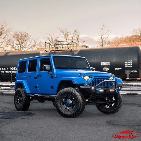 Jeep Wrangler wrapped in 3M 1080 Matte Blue Metallic vinyl