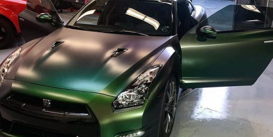 Nissan Gtr wrapped in Avery Satin Urban Jungle Silver/Green/Purple shade shifting vinyl