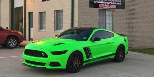 Ford Mustang wrapped in 3M Neon Fluorescent Green vinyl