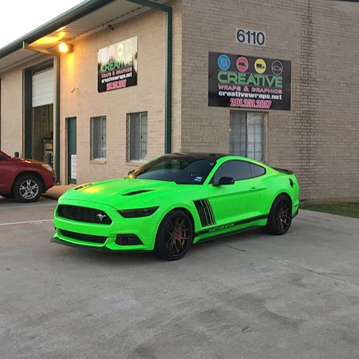 Ford Mustang wrapped in 3M Neon Fluorescent Green vinyl