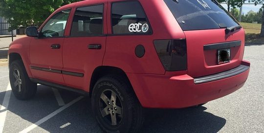Jeep Grand Cherokee wrapped in Avery SW Matte Garnet Metallic vinyl