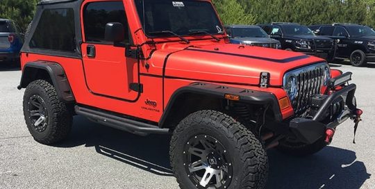 Jeep Wrangler wrapped in 3M 1080 Matte Red vinyl