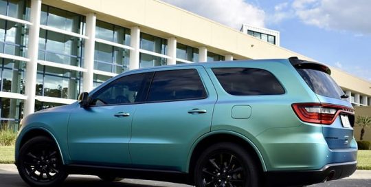 Dodge Durango wrapped in Orafol 970RA Shift Effect Matte Aquamarine shade shifting vinyl
