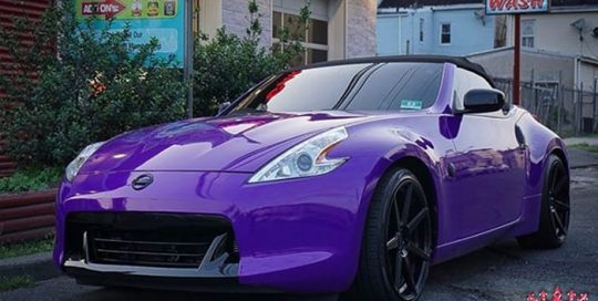 Nissan 370z wrapped in 3M 1080 Gloss Plum Explosion vinyl