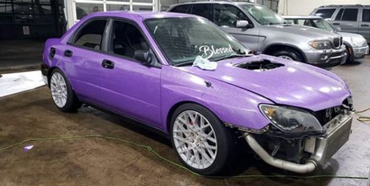 Subaru wrapped in Avery SW Diamond Purple vinyl