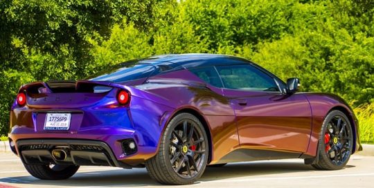 Lotus Evora wrapped in Avery ColorFlow Gloss Roaring Thunder Blue/Red shade shifting vinyl