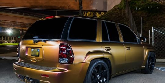 Chevrolet Trailblazer wrapped in Avery ColorFlow Satin Rising Sun Red/Gold shade shifting viny