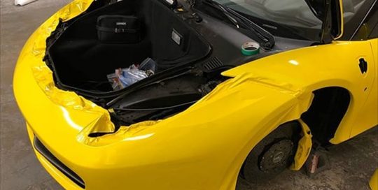Ferrari 458 wrapped in 3M 1080 Gloss Bright Yellow vinyl