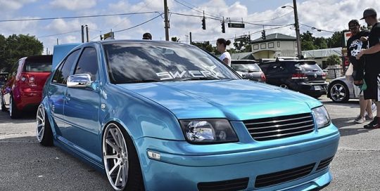 Volkswagen wrapped in 3M 1080 Gloss Atomic Teal vinyl