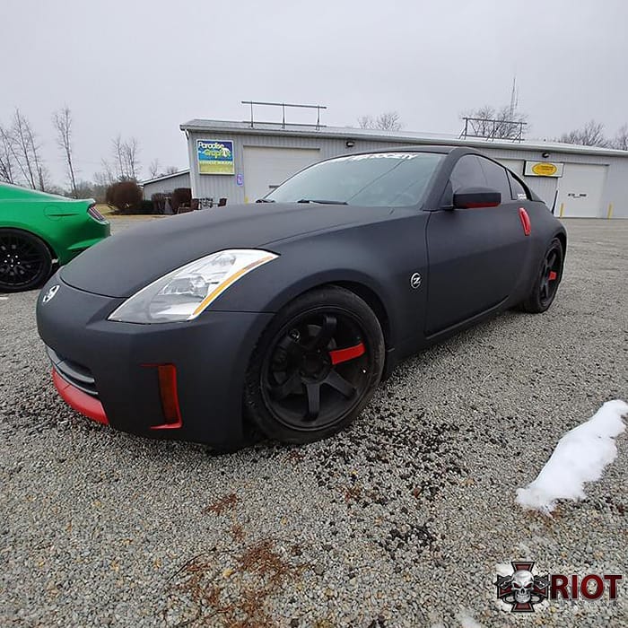 Nissan 350z wrapped in 3M 1080 Matte Deep Black vinyl