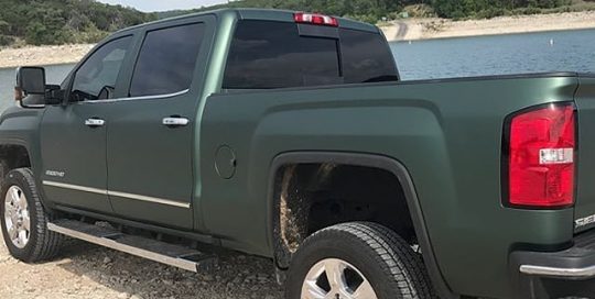 Gmc Sierra wrapped in 3M 1080 Matte Pine Green Metallic vinyl