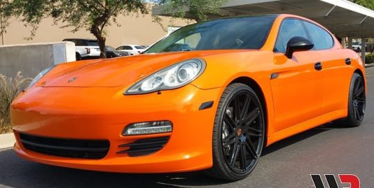 Porsche Panarama wrapped in Avery SW Gloss Orange vinyl