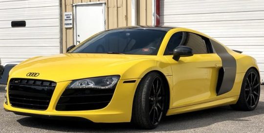 Audi R8 wrapped in 3M 1080 Gloss Bright Yellow vinyl