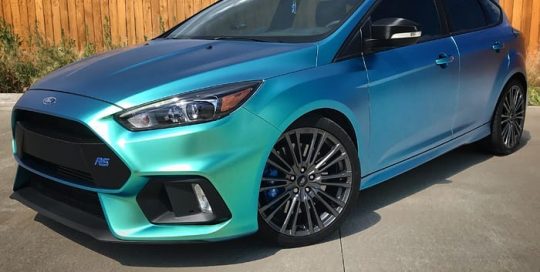 Ford Focusrs wrapped in Orafol 970RA Shift Effect Matte Aquamarine shade shifting vinyl