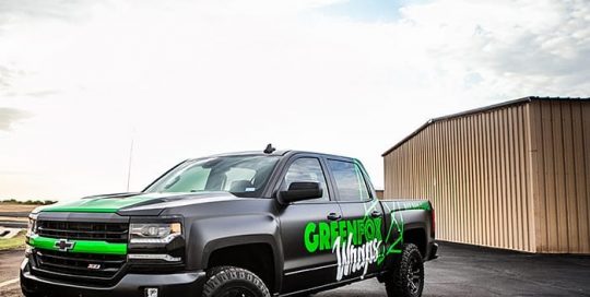 Chevrolet wrapped in Avery SW Satin Black and Arlon Green Chrome vinyls