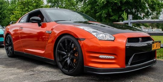 Nissan Gtr wrapped in 3M 1080 Gloss Fiery Orange vinyl