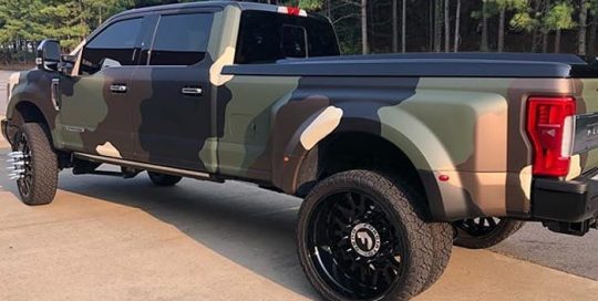 Ford F350 wrapped in M Matte Deep Black, Matte Military Green, Matte Brown Metallic, and Gloss Ivory with 8520 Matte Overlaminate vinyls