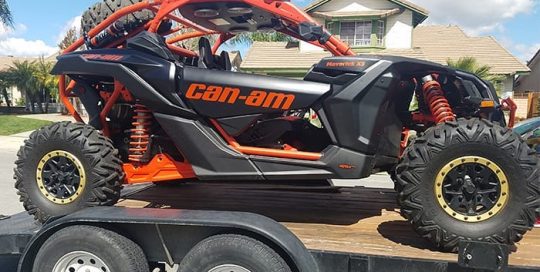 Canam wrapped in 3M 1080 Satin Black vinyl
